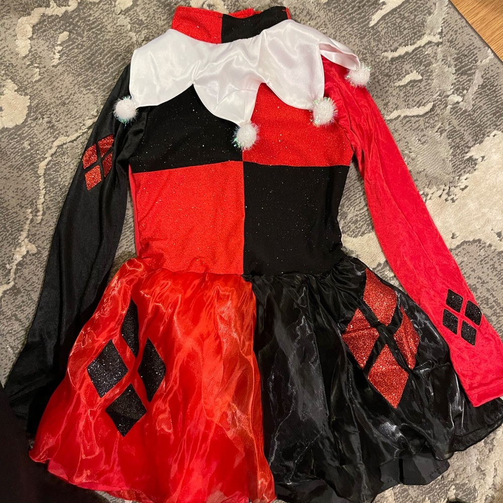 Girls Harley Quinn dress, size medium. Includes headband, mask and gloves.